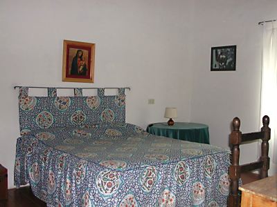 la camera da letto dell'agriturismo Loggia a 200 metri dalle Terme di Saturnia in Toscana